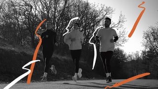 Runners smiling and running